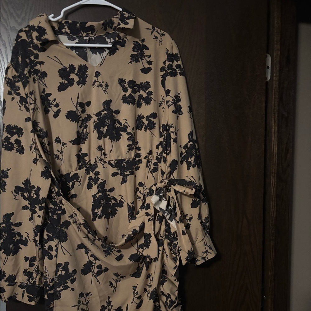 Tan dress with black floral.